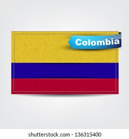 Fabric texture of the flag of Colombia with a blue bow. (Vector EPS10)
