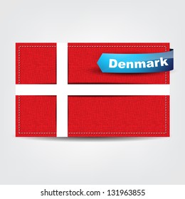Fabric texture of the flag of Denmark with a blue bow.