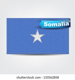 Fabric texture of the flag of Somalia with a blue bow. (Vector)