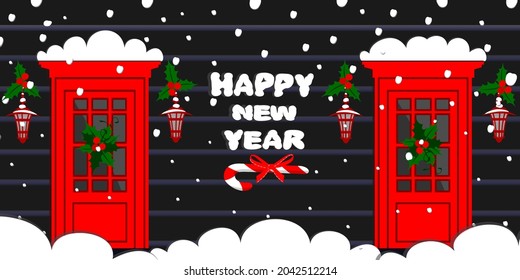 The facade of a black frame house, a stained-glass window, covered with snow. Winter holidays, New Year's holidays, Christmas, Thanksgiving. The concept of construction, landscape design, country life