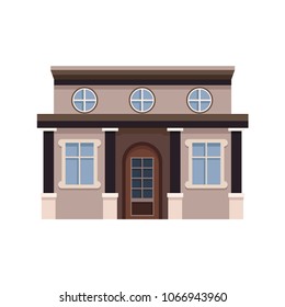 Facade of light gray building with round and rectangular windows