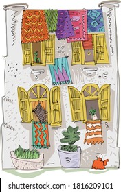 A facade of traditional vintage moroccan house decorated with traditional oriental carpets. Medieval heritage. Handmade sketch.