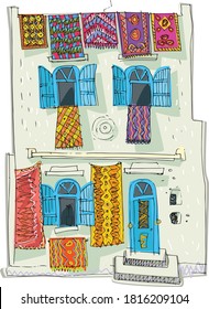 A facade of traditional vintage moroccan house decorated with traditional oriental carpets. Medieval heritage. Handmade sketch.