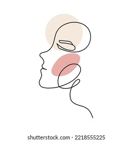 The face of a beautiful woman in the style of line art with colored spots. vector illustration