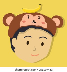 Face of a boy with monkey hat in yellow background.