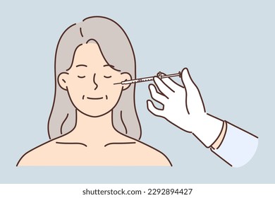 Face of elderly woman and syringe for cosmetic services and use of skin lifting or getting rid of wrinkles. Elderly lady is injected with injection of cosmetic product during rejuvenating procedure. 