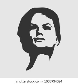 Face front view. Elegant silhouette of a female head. Short hair. Monochrome gamma.