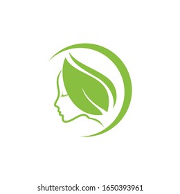 face and green leaves. Creative logo beauty concept design. trend vector logo