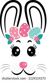 The face of the rabbit with a wreath of eggs. Easter bunny face on white isolated background. Easter bunny face