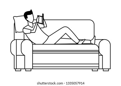 faceless man reading sofa in black and white