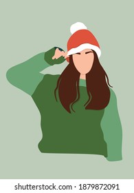 Faceless portrait of a beautiful excited young girl wearing warm winter clothes and Santa hat, waiting for Christmas