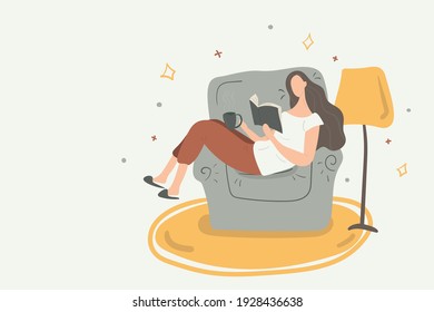 Faceless portrait of a young girl sitting in the armchair relaxing, drinking hot tea and reading, concept of cozy staying home