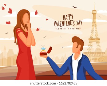 Faceless Young Man Proposing His Girlfriend in Front of Eiffel Tower Monument on the Occasion of Happy Valentine's Day Celebration.