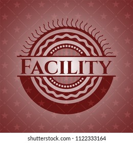 Facility badge with red background