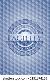 Facility blue badge with geometric background.