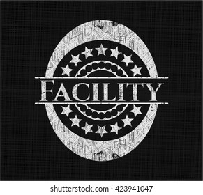Facility chalk emblem written on a blackboard