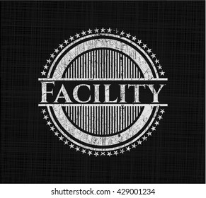 Facility chalkboard emblem on black board