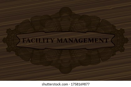 Facility management text inside Currency wooden realistic emblem. Brown fancy background. Artistic illustration. 