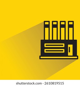 factory building icon with shadow on yellow background