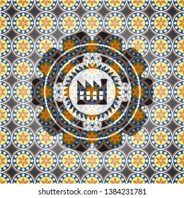 factory icon inside arabesque badge. arabic decoration.