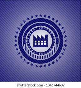 factory icon inside badge with denim texture