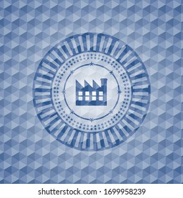 factory icon inside blue badge with geometric pattern background.