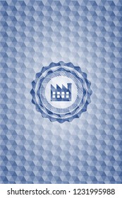 factory icon inside blue emblem with geometric pattern background.
