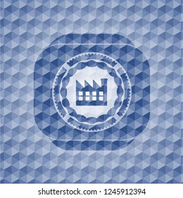 factory icon inside blue emblem or badge with geometric pattern background.