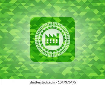 factory icon inside green mosaic emblem