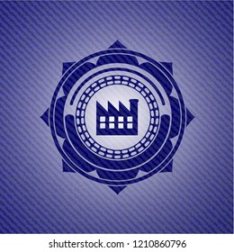factory icon inside jean or denim emblem or badge background