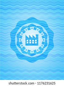 factory icon inside light blue water style emblem.