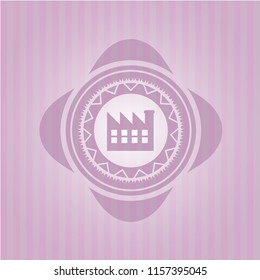 factory icon inside pink emblem