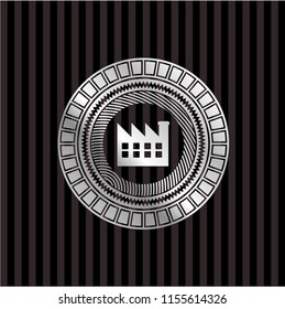factory icon inside silver emblem