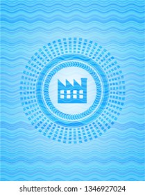 factory icon inside water concept badge.