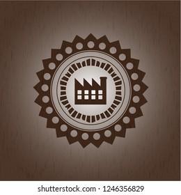 factory icon inside wood emblem