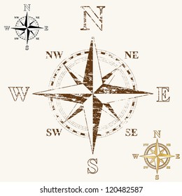 Faded compass rose, with gold, and plain black and white versions.
