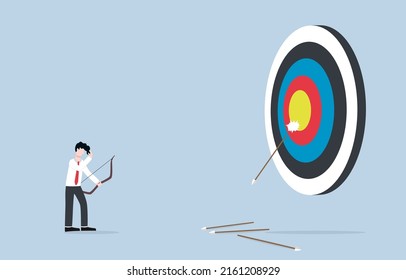 Failure due to setting target larger than ability, business negligence, waste effort for unrealistic goal concept. Businessman disappointedly missed giant target.