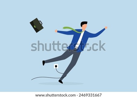Failure or mistake, clumsy businessman tripping over  power cord electrical plug that fell to the floor.