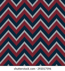 Fair Pattern sweater design on the wool knitted texture. Seamless Knitting Ornament. USA flag colors