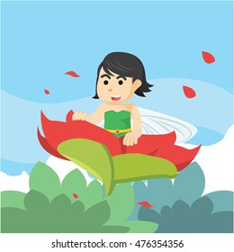 fairy flying over flowers