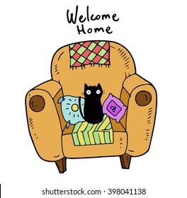 Faithful devotee kitten home alone sitting in the large armchair with a lot of colorful pillows and plaids and waiting for his master when he returns home