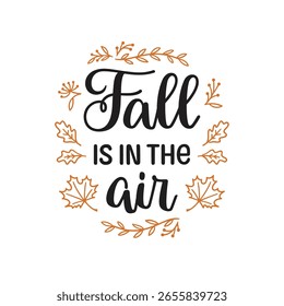 Fall is in the air hand lettering composition with autumn leaves