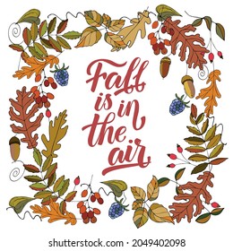 Fall is in the air vector illustration lettering with autumn leaves.