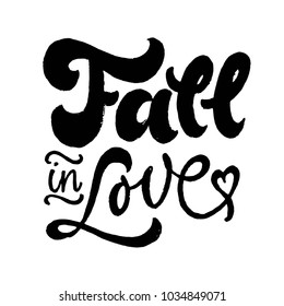 Fall in Love lettering. Brush pen hand drawn calligraphy. Black on white. Valentines day.
