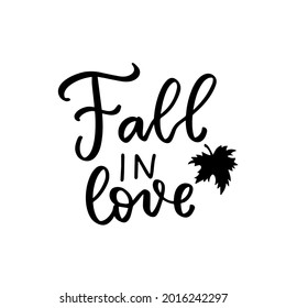 Fall in love phrase with maple leaf . Autumn thanksgiving hand lettering phrases. Happy harvest quote.. Brush calligraphy. Hand written text overlay for greeting card design. American holidays