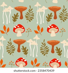 Fall Seamless Pattern with Mushrooms, Tree Branches, Berries and Leaves on a Blue Background. Natural Trendy Print.