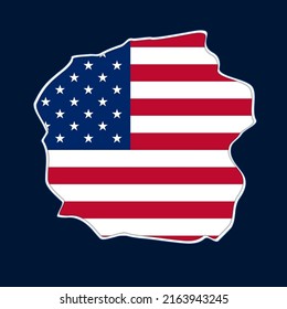  A fallen piece of the wall and the flag of the United States of America.