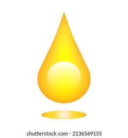 Falling drop of golden oil, juice, paint. Golden Oil drop isolated on white background.