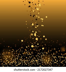 falling gold glitter stardust trail on black background.