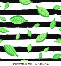 Falling leaves seamless vector pattern. Flat foliage texture. Green leafage on striped background